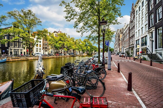 Amsterdam Day Trip from Brussels With Cheese, Clogs and Windmills - The Guided Walking Segment: Royal Palace Area, Waterways, and Red Light District Views