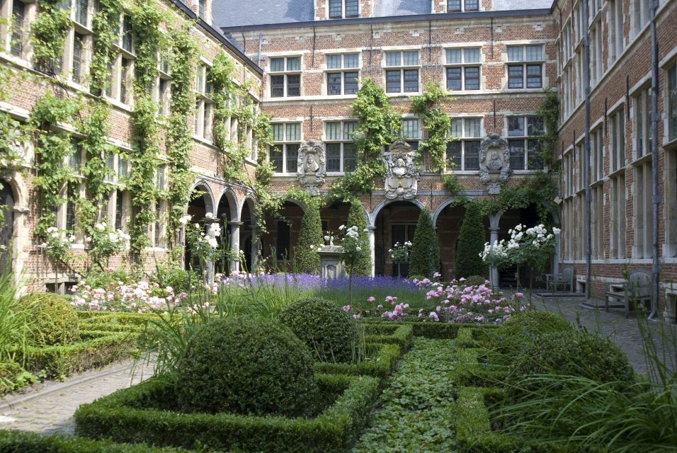 Antwerp: Private Historical Highlights Walking Tour - Hendrik Conscience Statue and Baroque church stops: Words, faith, and local memory