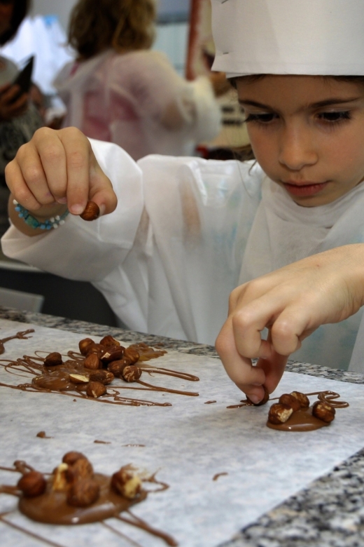 Bruges: Chocolate Making Workshop and Chocolate Museum Entry - Choco-Story museum time: interactive exhibits and a big artifact collection