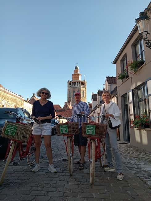 Bruges: Guided Retro Bike Tour of Highlights and Hidden Gems - Church of Our Lady, the Beguinage, and the slower side of Bruges