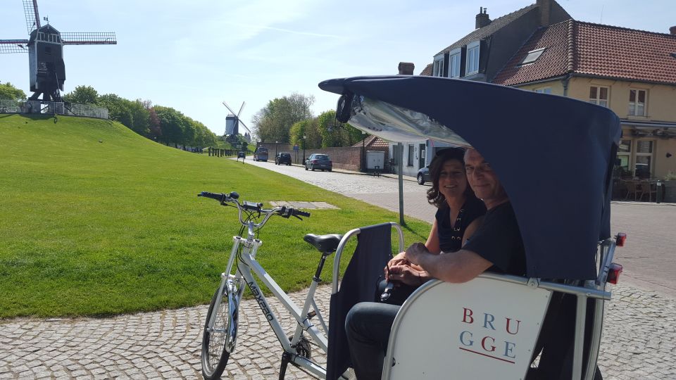 Bruges: Guided Rickshaw Tour - The main sights pass by fast, but you learn what to look for