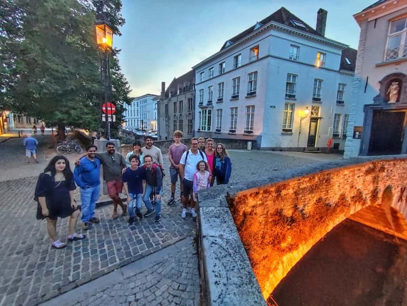 Bruges: Nightly Tales and Untold History Walking Tour - Start at the Belfry Tower, Look for the Yellow Umbrella