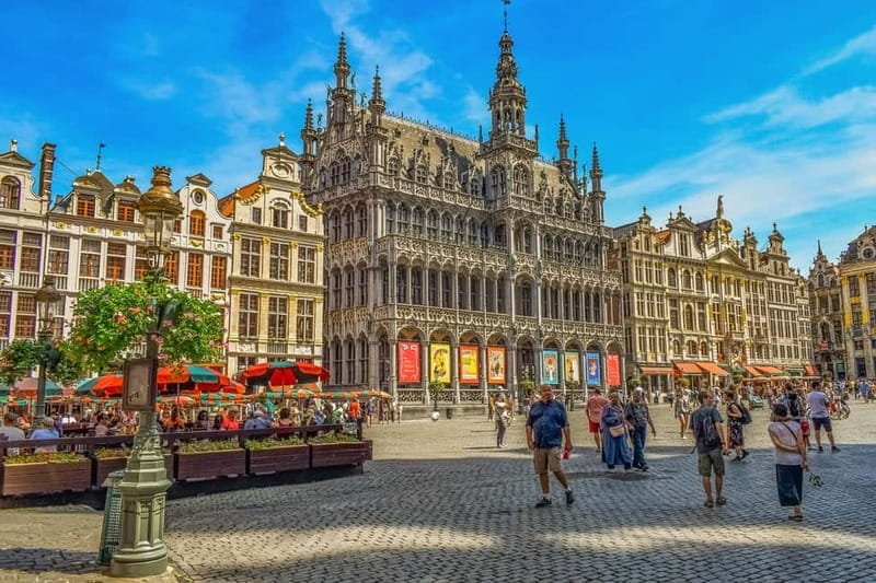 Brussels Highlights: Walking & Bus Tour with Waffle Tasting - Entering Brussels by bus first, then on foot