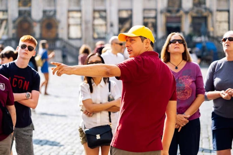 Brussels: Historical Tour with Chocolate & Waffle Tasting - Manneken Pis and the waffle break that makes the tour feel real