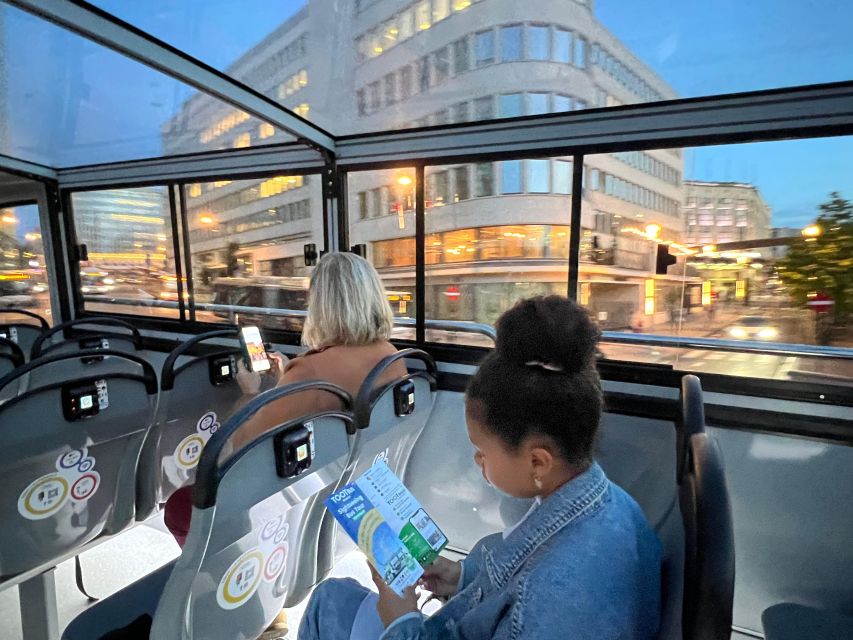 Brussels: Sightseeing Sunset Bus Tour - Getting on the bus: panoramic comfort, Wi‑Fi, and audio