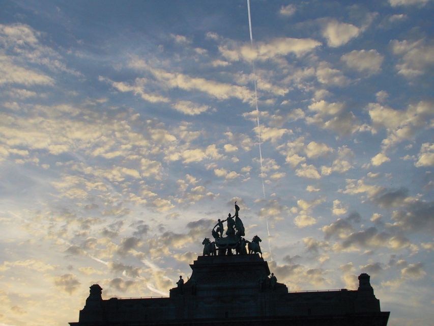 Brussels: Walking Tour from Central Station to Manneken Pis - Grand Place: Gothic Town Hall and gold-leaf guild power