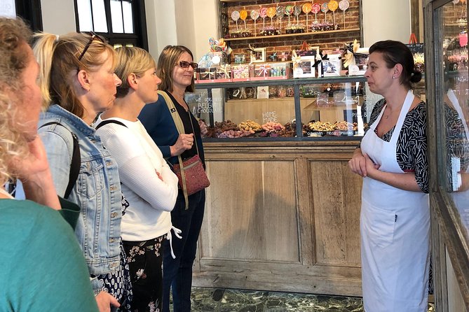 Discover authentic Ghent with historian & taste the best chocolate - Korenmarkt: 800 years of houses and the fun of mysterious inscriptions