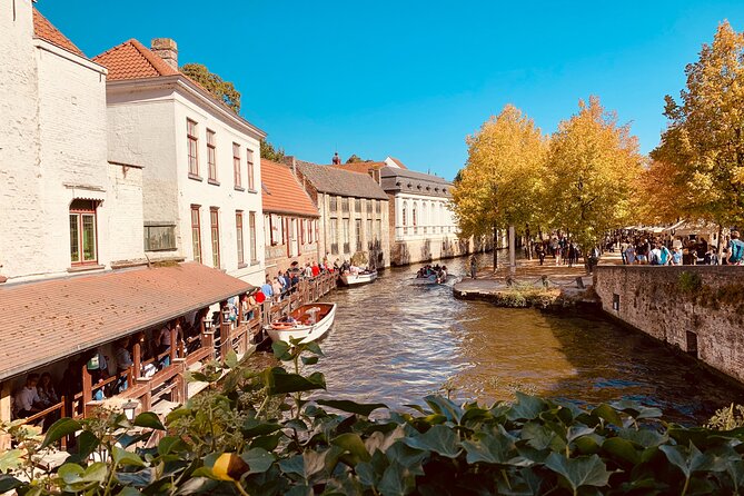 Experience the best of Bruges on a Private Tour with Boat Ride - Poortersloge and contemporary art: a smart twist at a historic pace