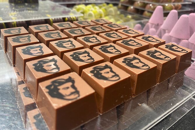 Ghent: Famous Belgian Chocolate Walking Tour with Tastings - Stop 1: Chocolatier Deduytschaever and the Praline-First Welcome