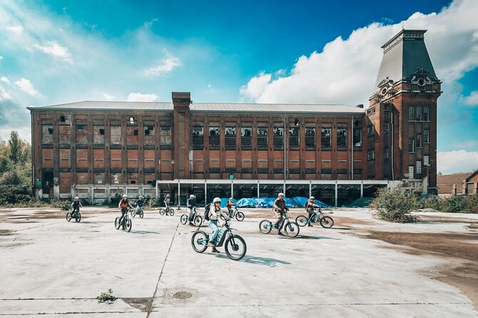 Ghent guided offroad tour by e-scooter - Handelsdokken: Historic Harbor Warehouses Meet Modern Ghent
