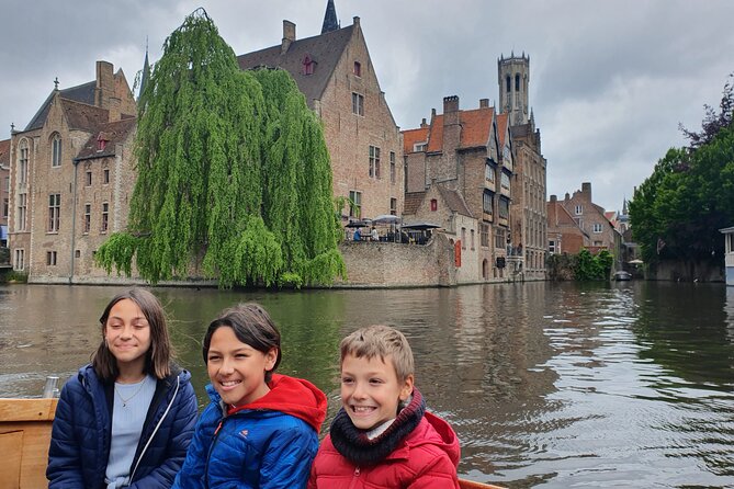 Guided boat trip and walk - From Historium Bruges to the Markt: belfry, guild houses, and town-square drama