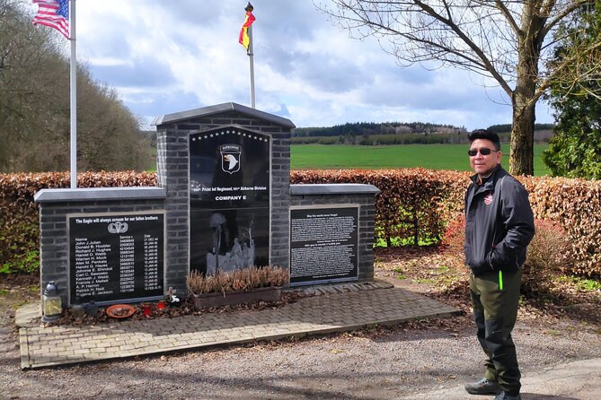 Historic Battle of the Bulge Sites Tour from Brussels - Bastogne town square: Sherman tank photos and McAuliffe’s statue