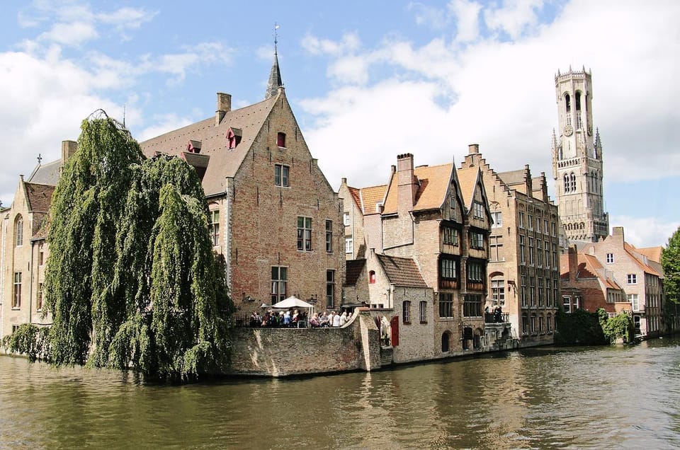 Historical walk in Bruges with local guide. Praline included - Church of Our Lady: art, faith, and what locals mean