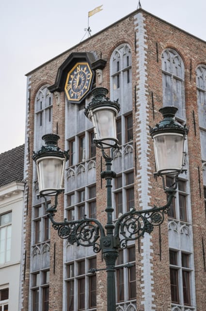 Historical walk in Bruges with local guide. Praline included - Canals, Dijver, Tanners Square, and the red-light district