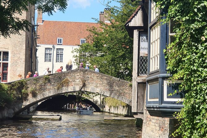 Private tour: From your hotel + see the Madonna of Michelangelo - Ten Wijngaarde beguinage: a calm pocket inside the medieval city