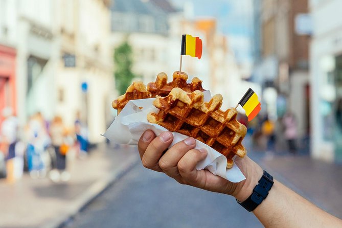 The 10 Tastings of Bruges With Locals: Private Food Tour - Gruuthusemuseum exterior break and the classic waffles-and-fries angle